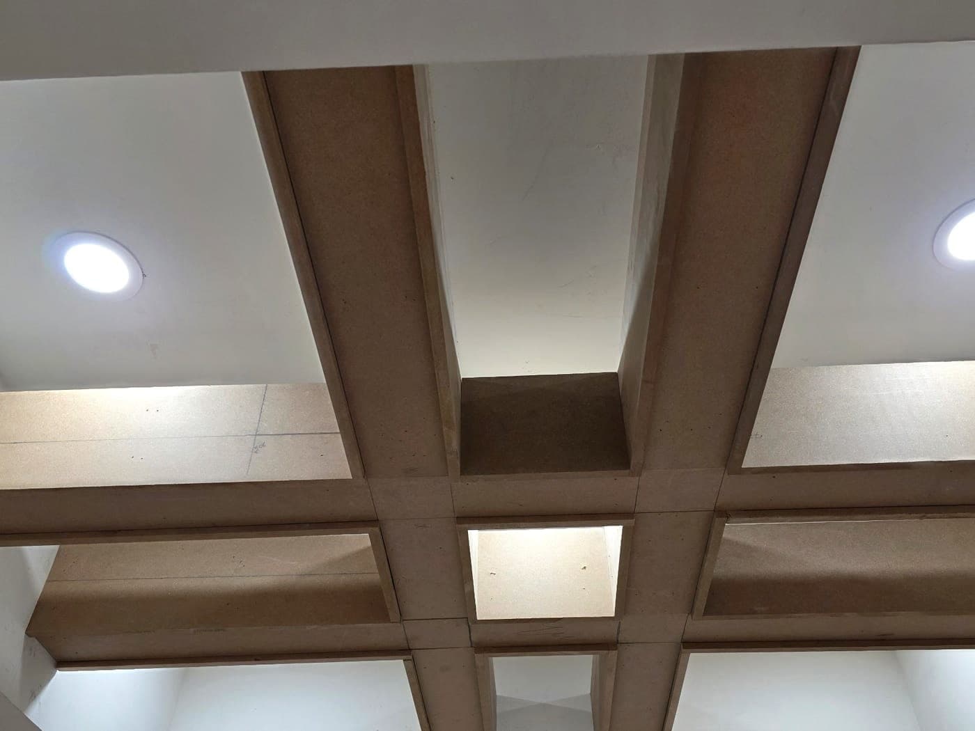 Finished coffered ceiling with recessed pot lights in a Richmond Hill basement